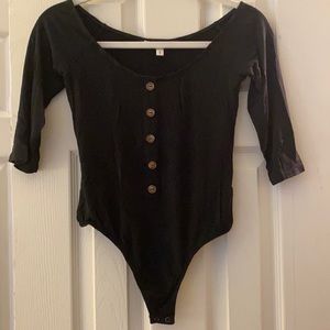 Black 3/4 sleeve bodysuit with brown buttons